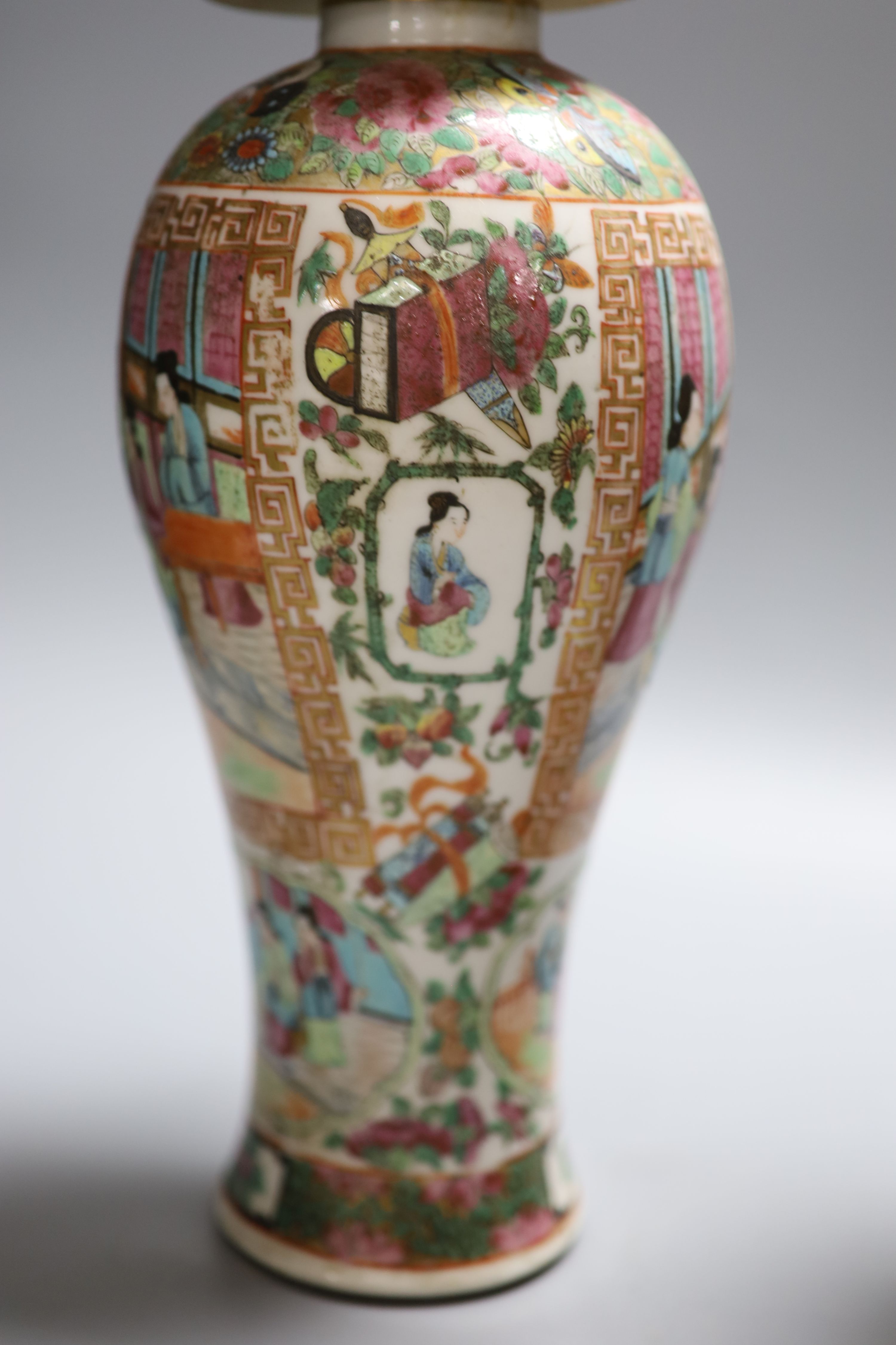 A pair of 19th century Chinese famille rose vases and associated covers, height excl. cover 28cm (a.f.)